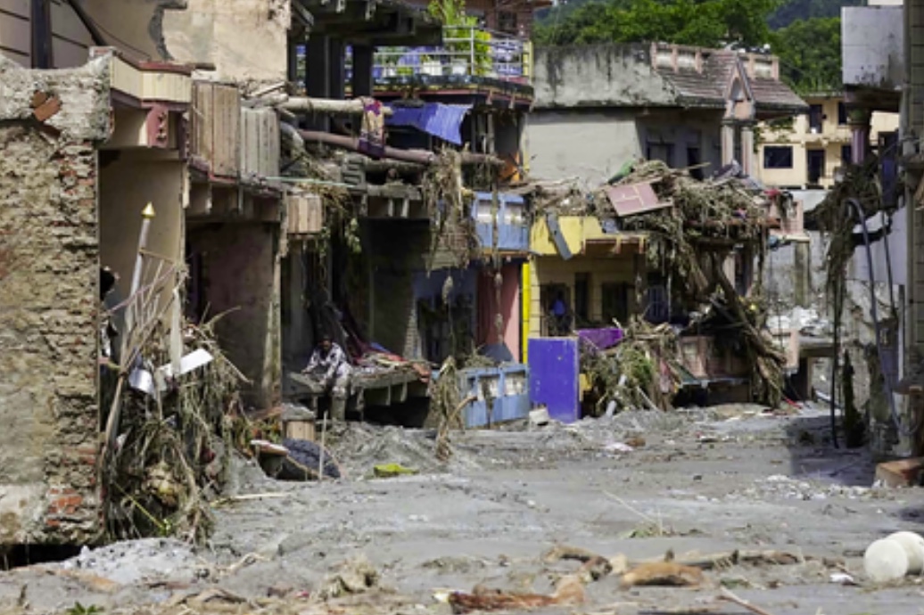 Homes and streets damaged by flooding in Nepal